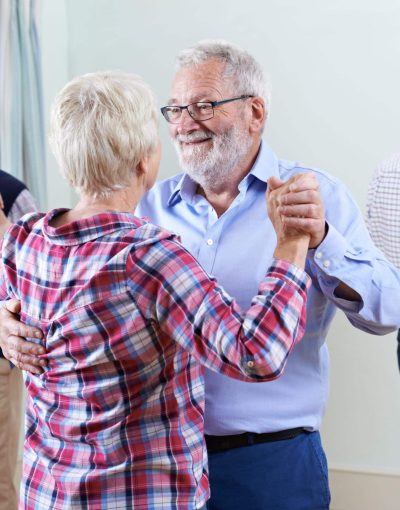 Group,Of,Seniors,Enjoying,Dancing,Club,Together